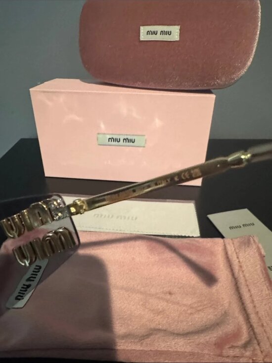 Miu Miu Pink Rimless Sunglasses with Gold Accents